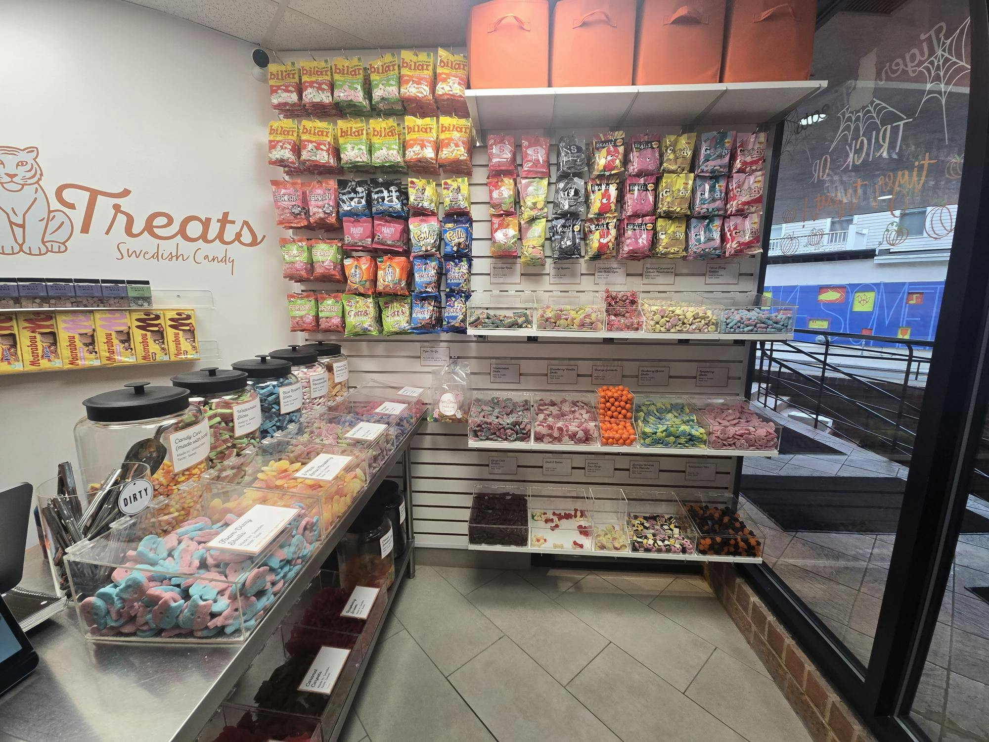 Inside Tiger Treats in Princeton, New Jersey, the state's only dedicated Swedish candy store, with pick-and-mix candy bags hanging on the wall